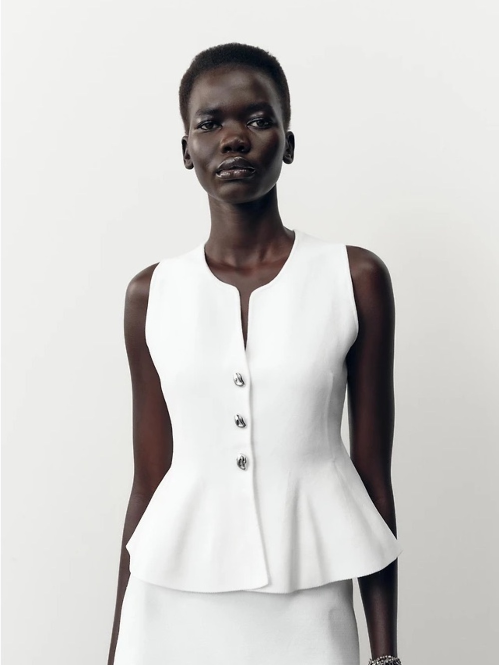 Zara White Sleeveless Peplum Top with Decorative Buttons
